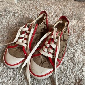 Coach woman’s 7 Red and Tan Sneakers